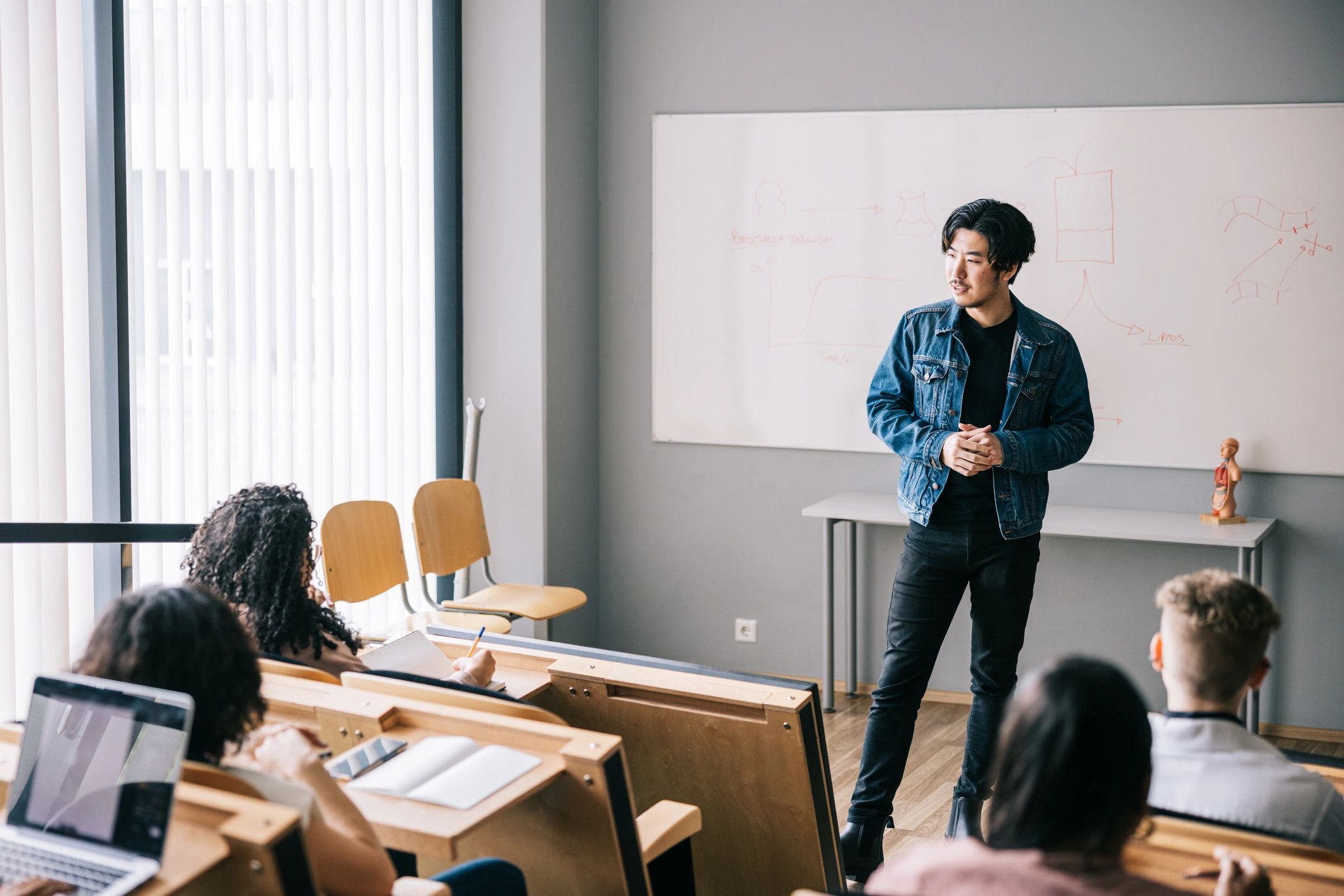 Group of students attending a university seminar