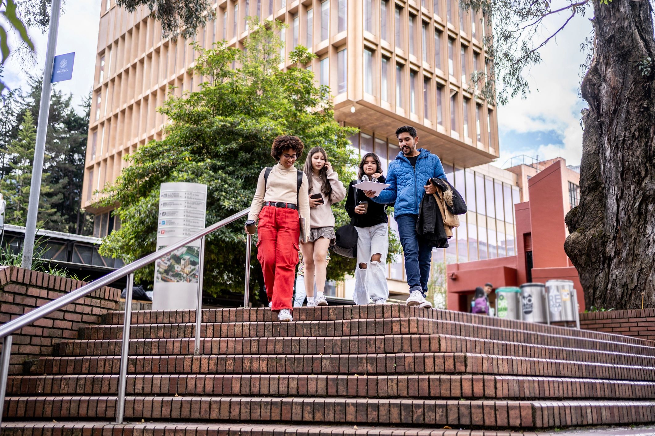 University students walking and talking on campus