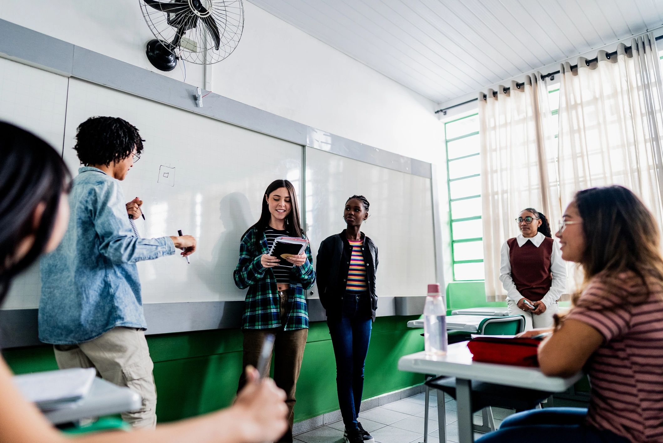 Students presenting in a classroom